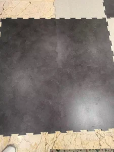 Interlocking Anti-Slip PVC LVT Flooring Tiles Stone Pattern Waterproof Movable for Gym Hotel Office Use