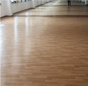 Professional 4.8mm Wood Grain PVC Sports Flooring Anti-Slip 1.2mm Wear Layer Indoor Dance Studio Basketball Gym Floor Mat