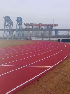 Sustainable Lightweight Self-Patterned Running Track for Educational Sports Facilities