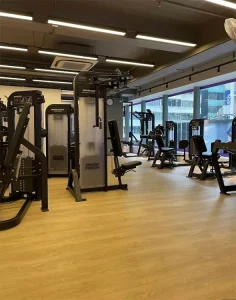 Wood Pattern PVC and Rubber Flooring Mat with Shock Absorption Eco Friendly Interlocking Tiles for Gyms